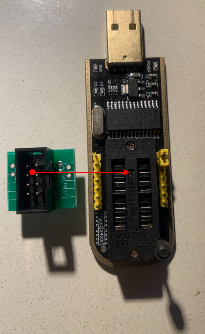 Close-up detailing the pin topography and yellow jumper configuration matrix